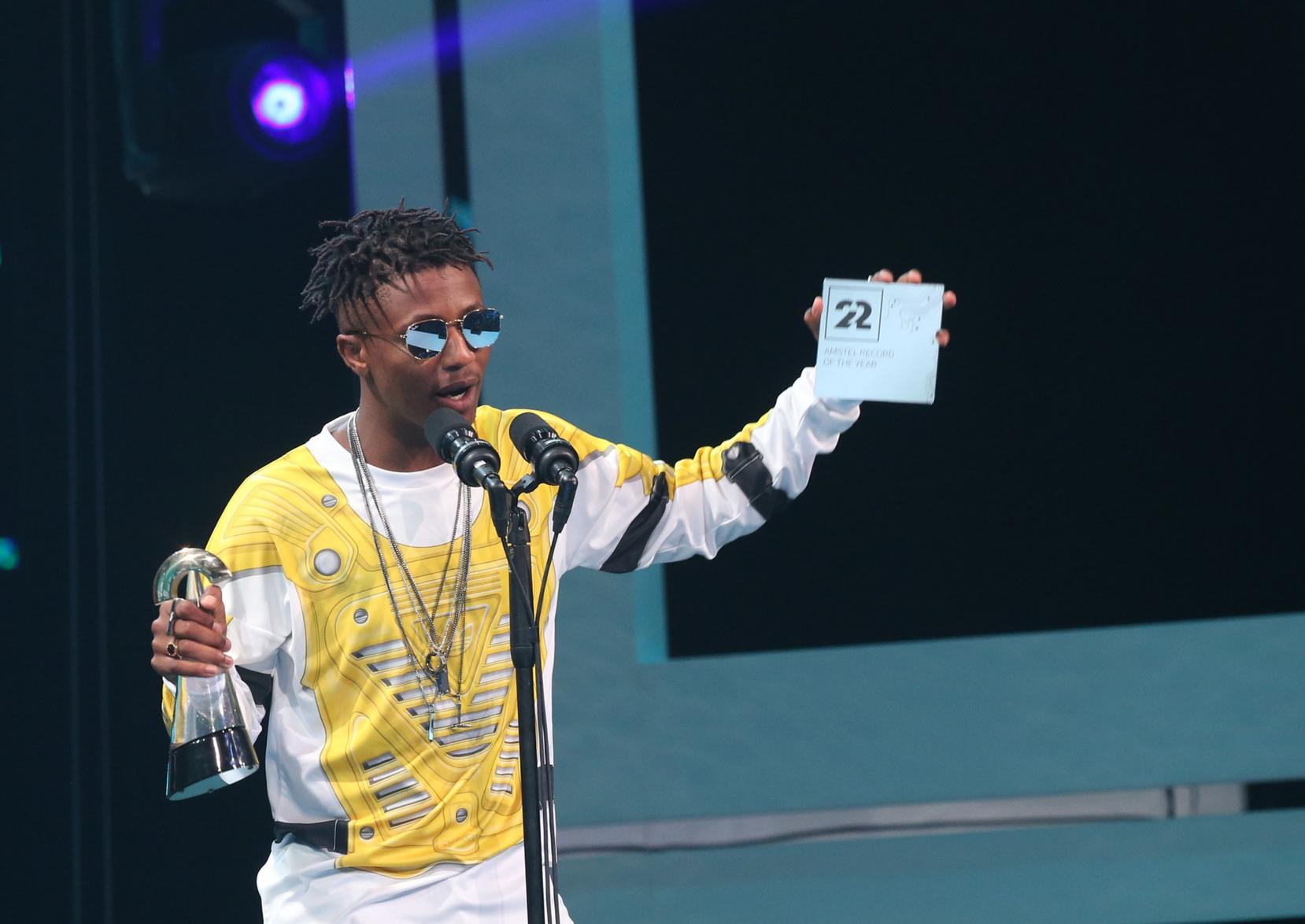 Emtee showing off his 2015 'South African Hip Hop Awards' trophy for the song of the year | courtesy