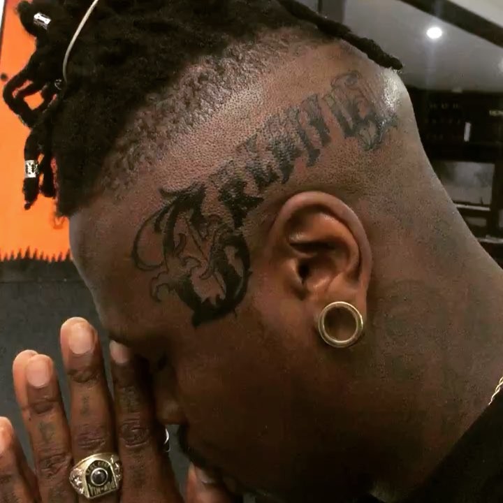 Stilo Magolide gets a “Grateful” head tattoo